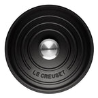 Satin Black Le Creuset casserole lid on a white background