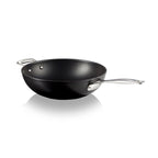 Black stir-fry pan with silver handles on a white background