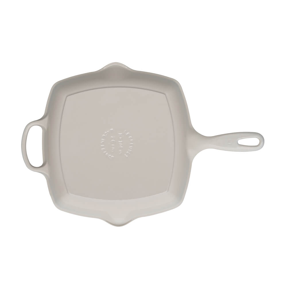 Meringue square grillit with handles on a white background