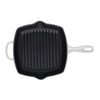 Meringue cast iron square grillit pan with ribbed surface on a white background