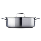 Stainless steel sauteuse with lid on a white background