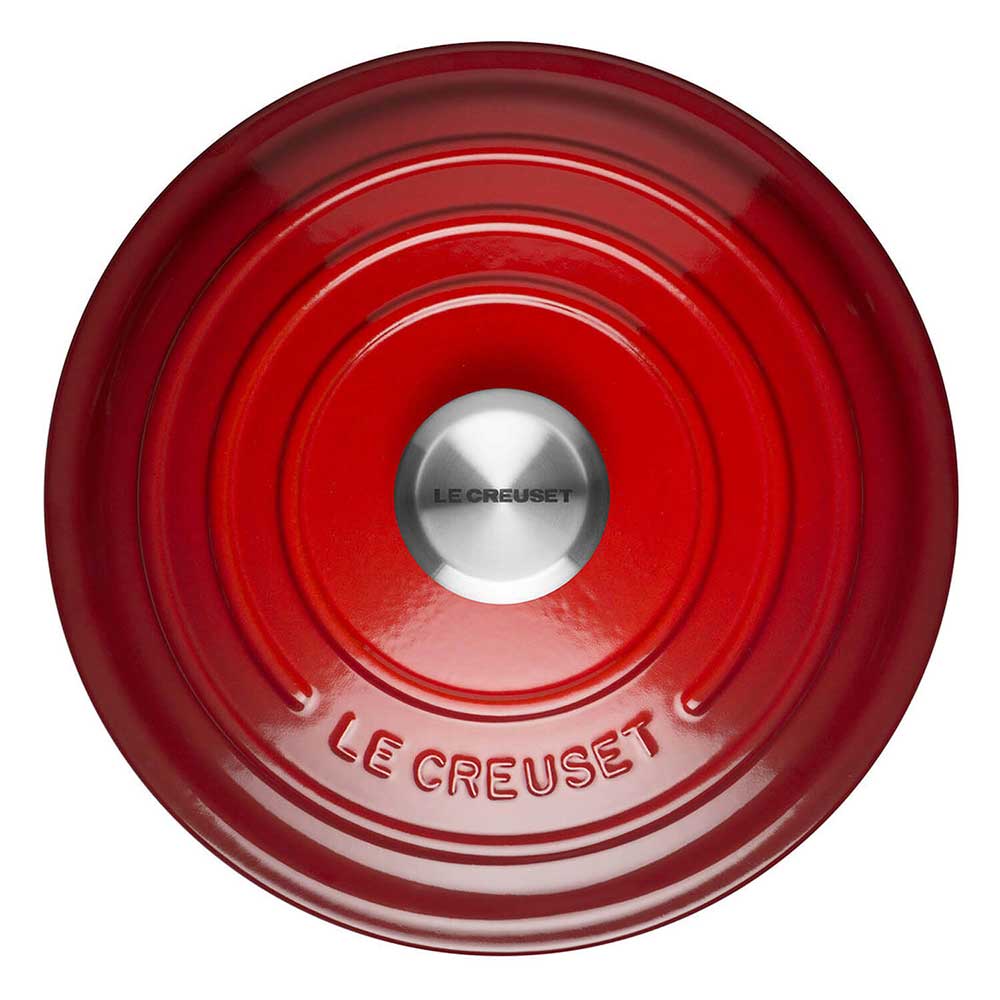 Cerise cast iron casserole dish lid with Le Creuset logo on a white background