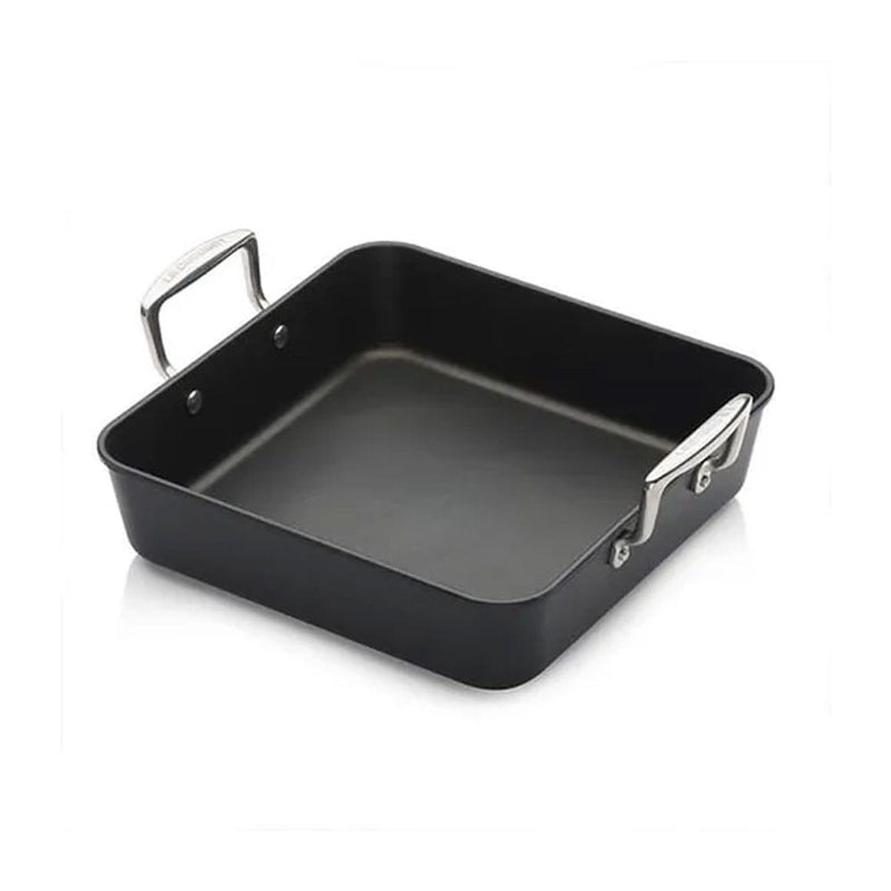 Black square roaster with silver handles on a white background