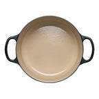 Satin Black cast iron casserole with beige interior on a white background