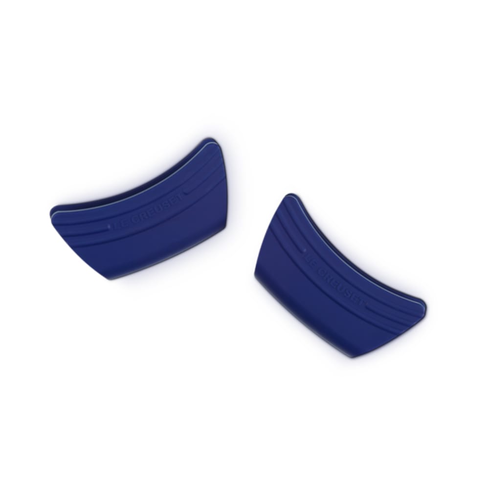 Two blue silicone wrist guards on a white background