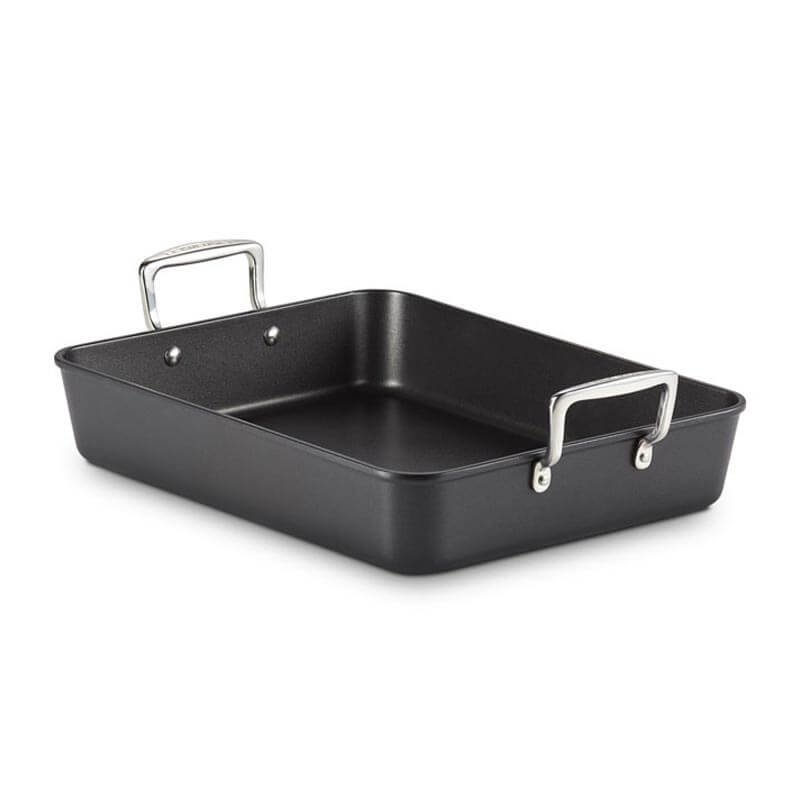 Black rectangular roasting pan with silver handles on a white background