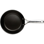 Omelette frying pan with a silver handle on a white background