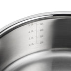 Stainless steel sauteuse with measurement markings on the lid