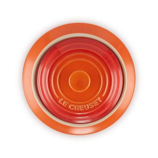 Top of Volcanic Le Creuset biscuit jar on a white background