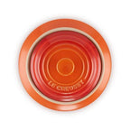 Top of Volcanic Le Creuset biscuit jar on a white background
