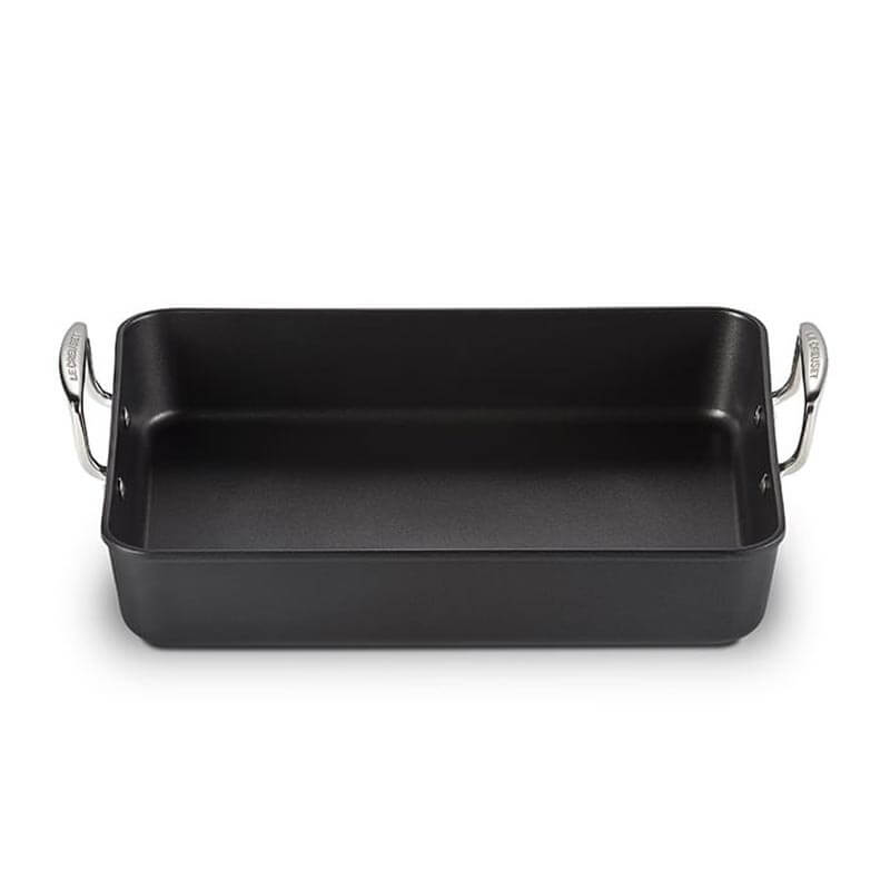 Black rectangular baking dish with handles on a white background