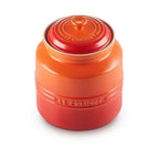 Volcanic jar with 'Le Creuset' branding on a white background