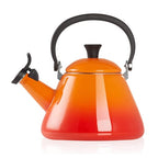 Volcanic kettle with black handle and safety valve on a white background