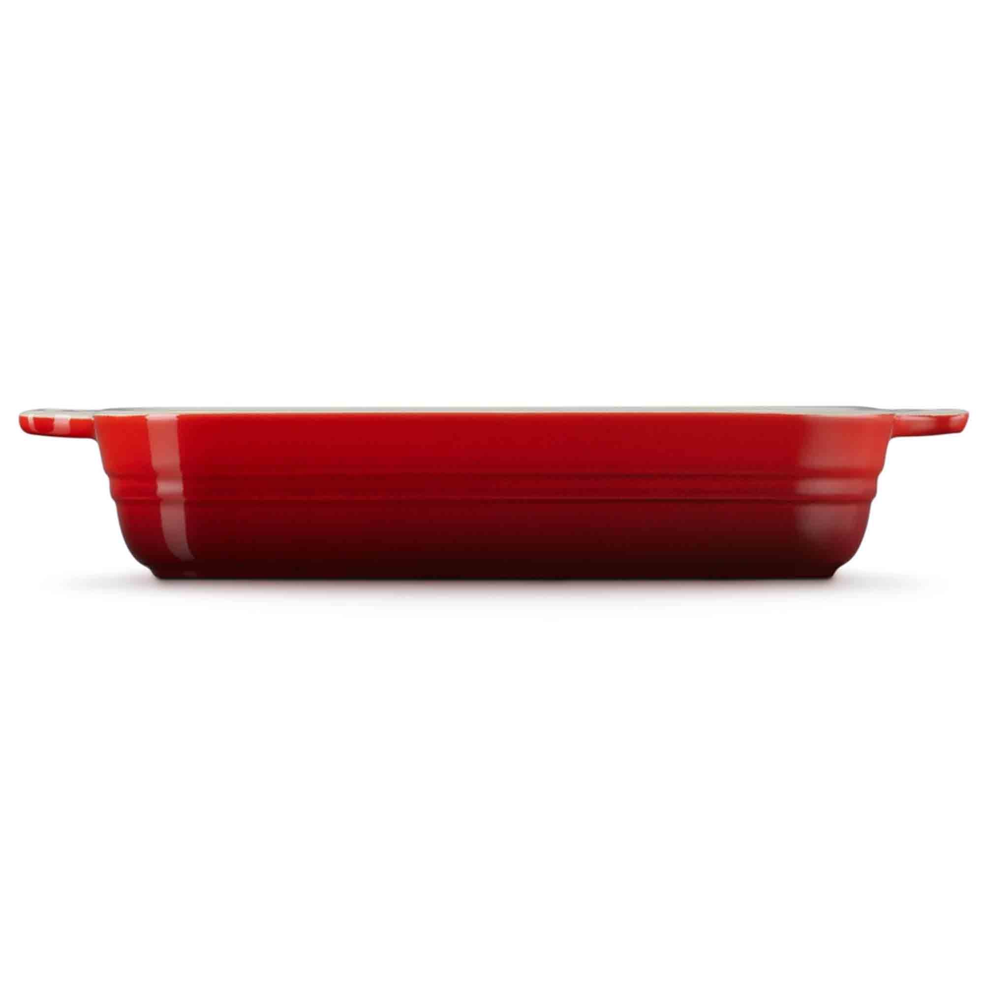 Cerise baking dish on a white background