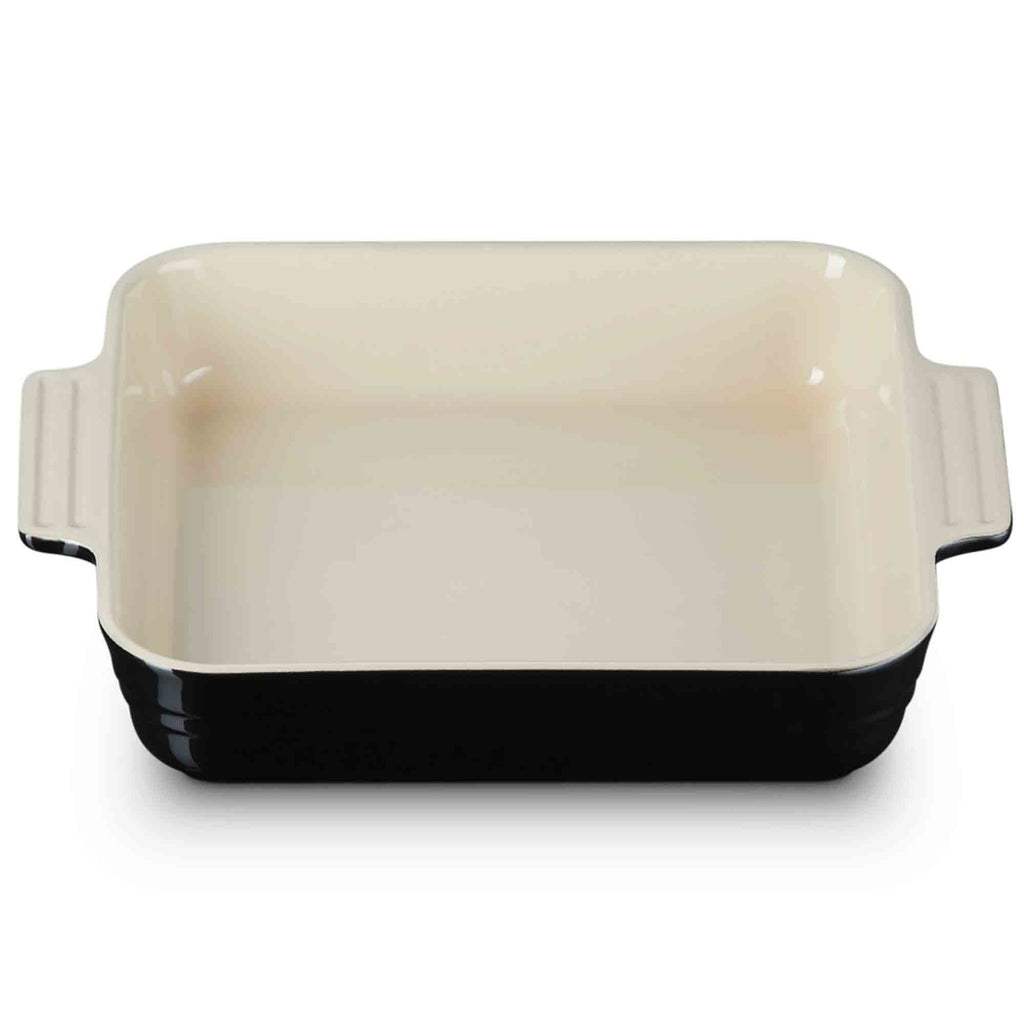 Baking dish with a black base on a white background