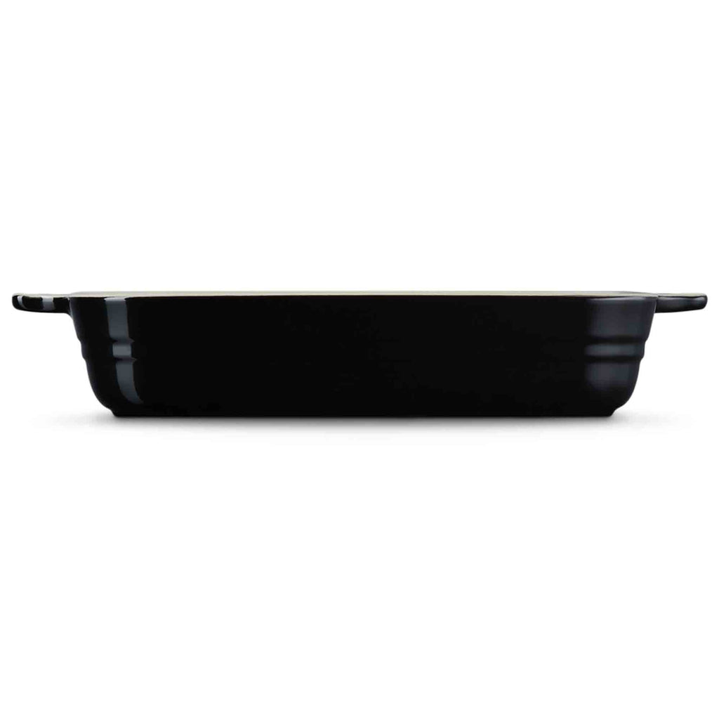 Baking dish with a black base on a white background