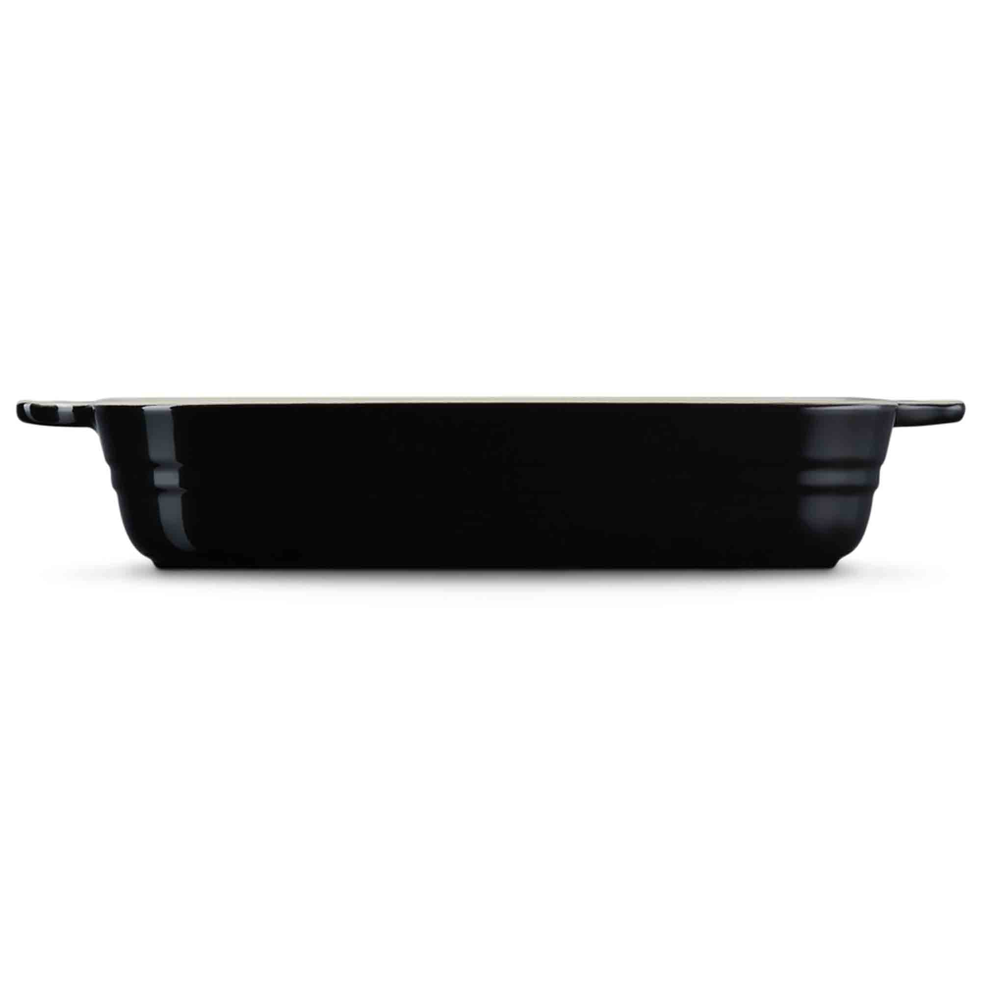 Baking dish with a black base on a white background
