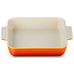 Rectangular baking dish with volcanic bottom and beige sides on a white background