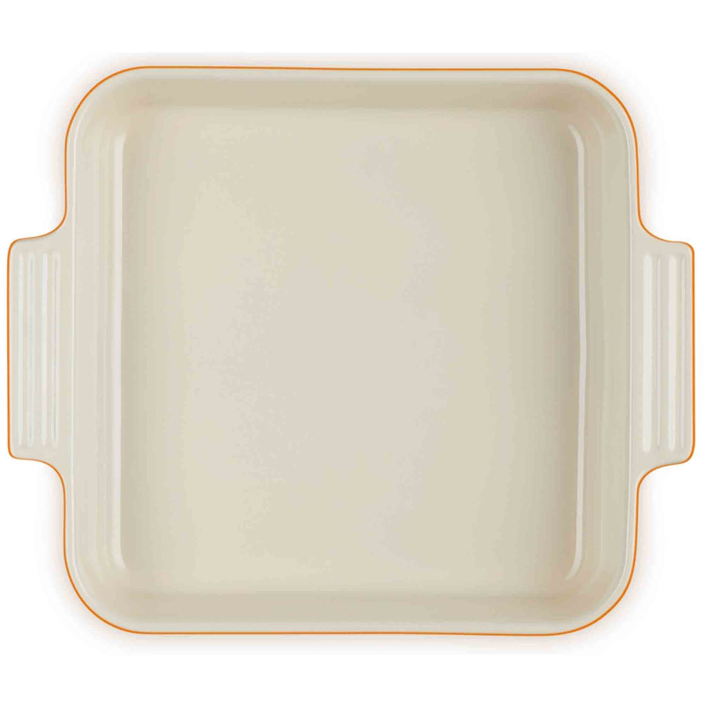 Rectangular baking dish with volcanic rim on a white background