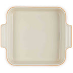 Rectangular baking dish with volcanic rim on a white background