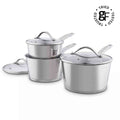 Three-piece stainless steel cookware set with glass lids, including a deep pot, a saucepan, and a smaller pot, shown on a white background with a 'Tried Tested' logo in the top right corner.