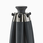 The top of a set of kitchen utensils on a carousel on a white background