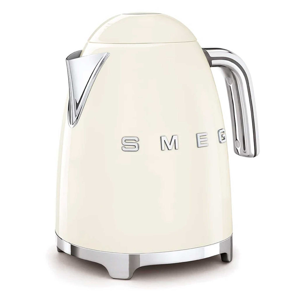 Cream-colored electric kettle with 'SMEG' branding on a white background