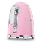 Pink kettle with silver accents on a white background