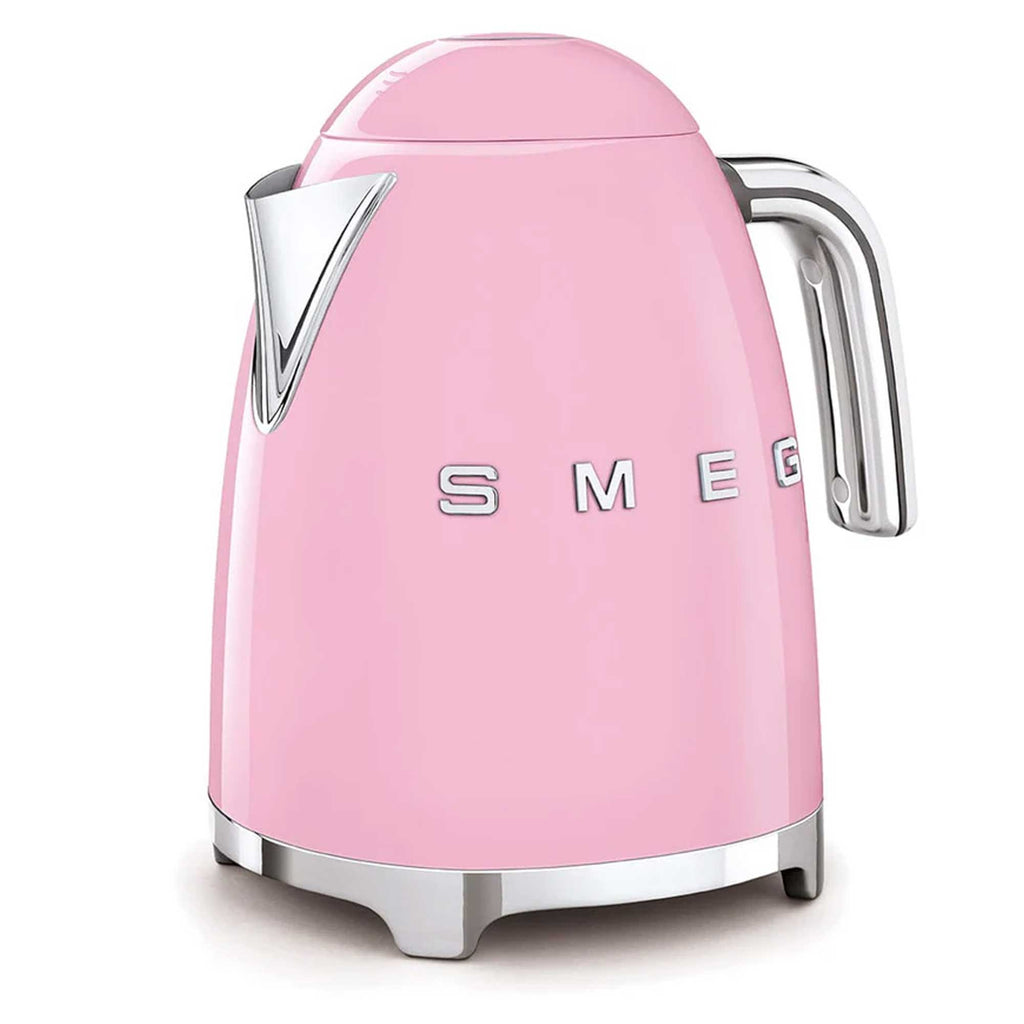 Pink electric kettle with 'Smeg' branding on a white background