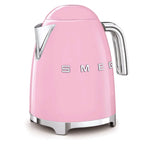 Pink electric kettle with 'Smeg' branding on a white background