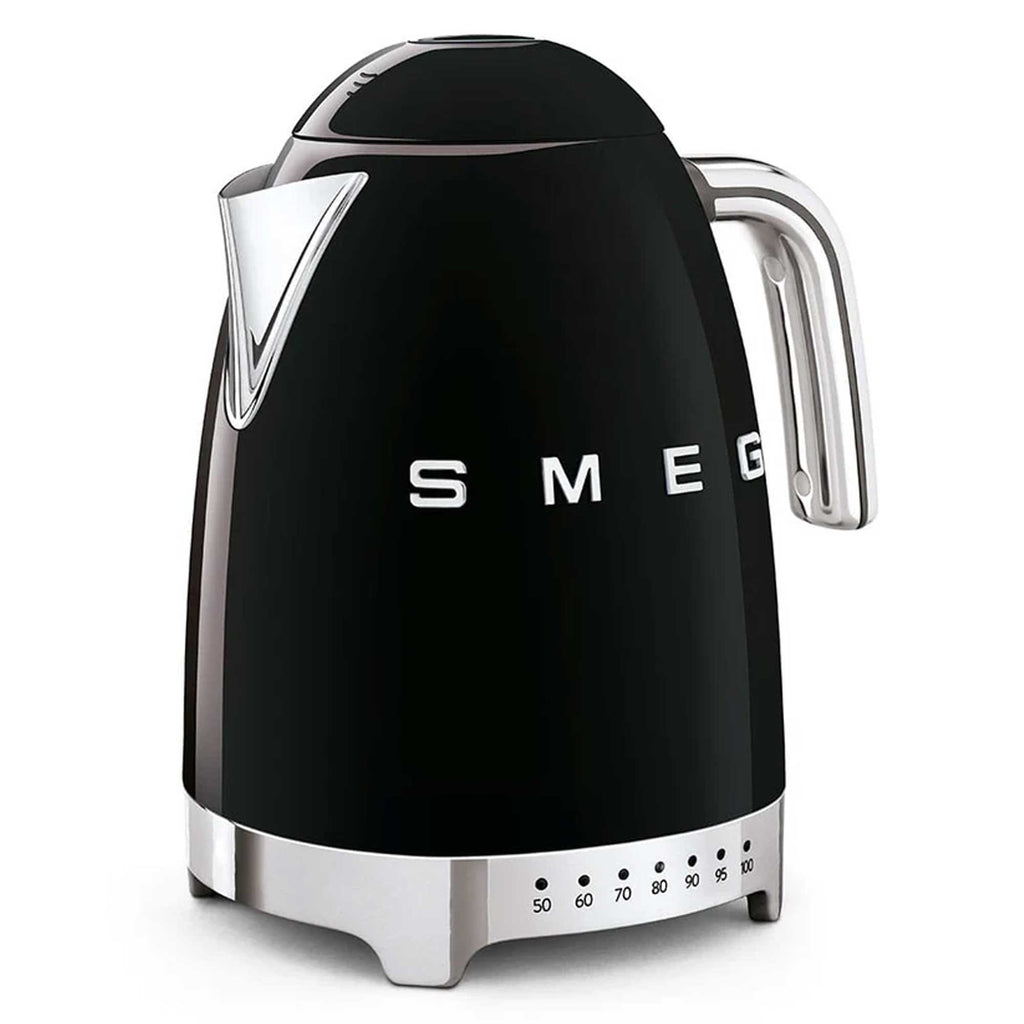 Black Smeg electric kettle with silver accents on a white background