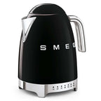 Black Smeg electric kettle with silver accents on a white background