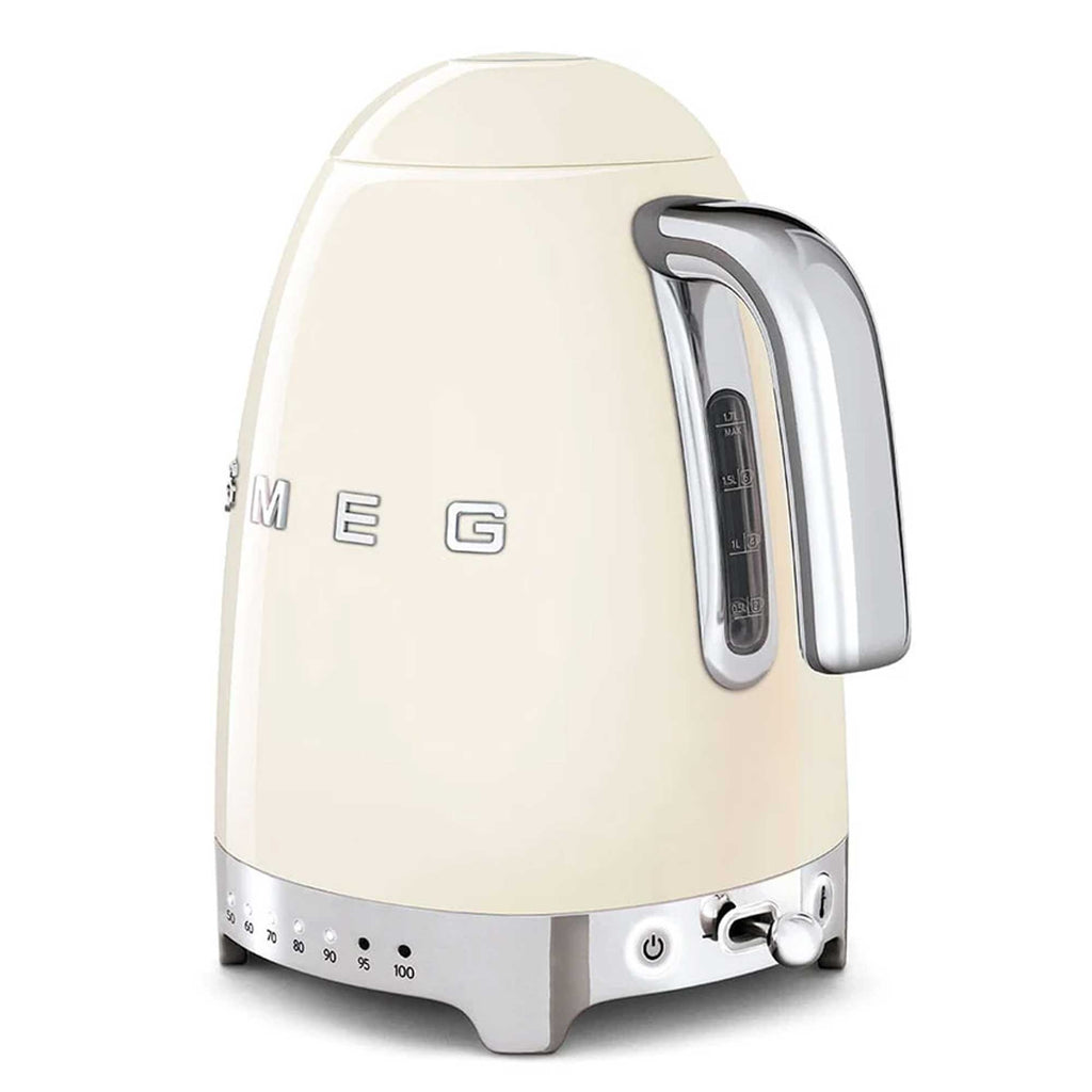 Cream-colored kettle with metallic accents on a white background