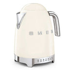 Cream-colored kettle with silver accents on a white background