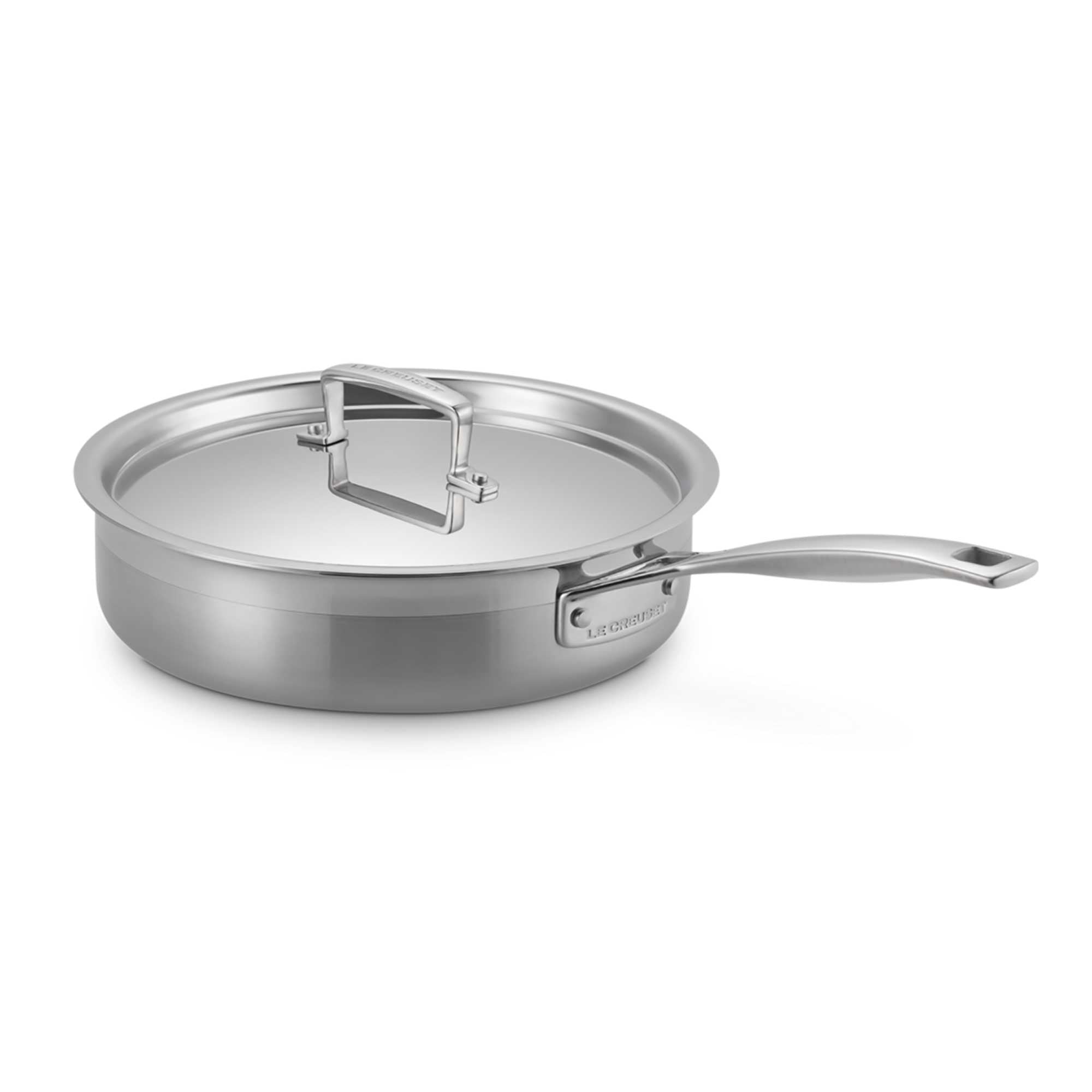 Stainless steel sauté pan with lid on a white background