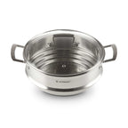 Silver steamer with lid on white background