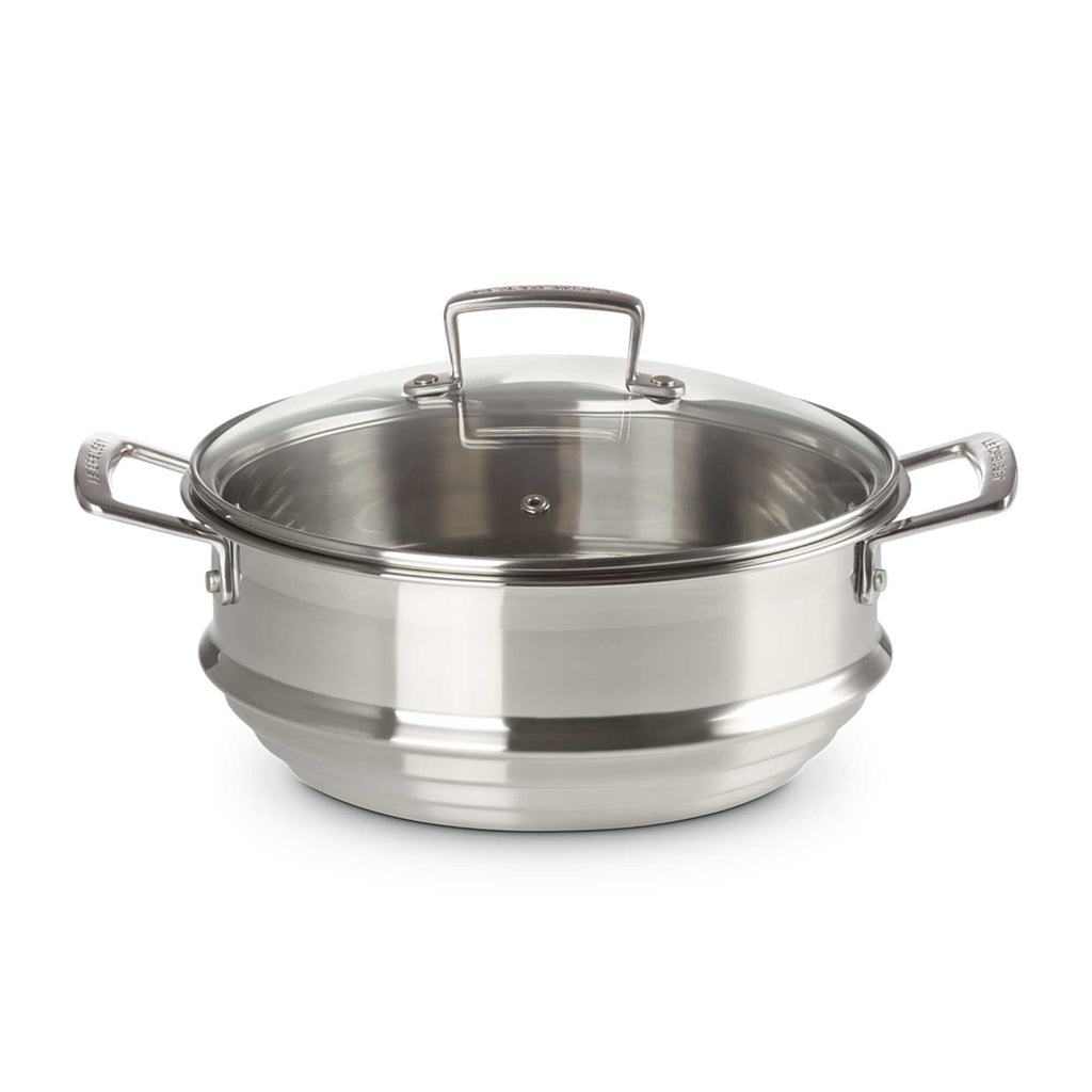 Silver steamer with lid on white background