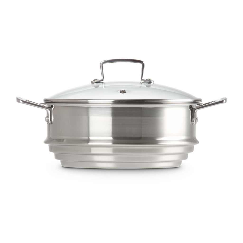 Silver steamer with lid on white background