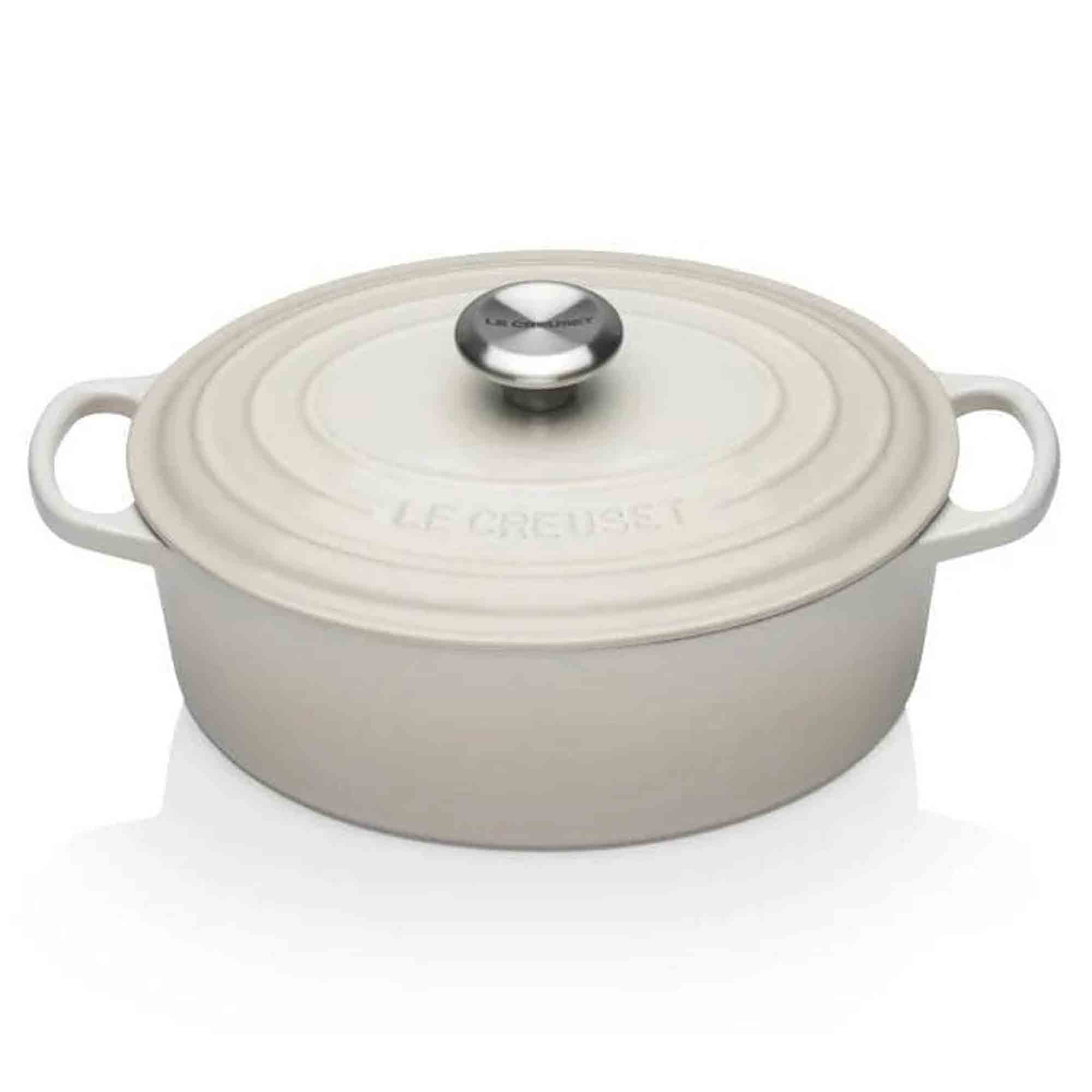 Le Creuset meringue oval casserole with lid on a white background