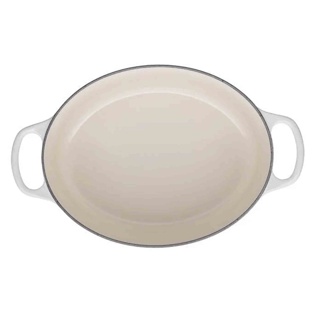 Le Creuset meringue oval casserole on a white background