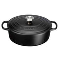 Satin black oval casserole with lid on white background