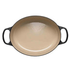 Satin black oval casserole with handles on white background