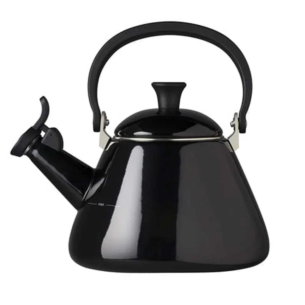 Black kettle with a lid on a white background