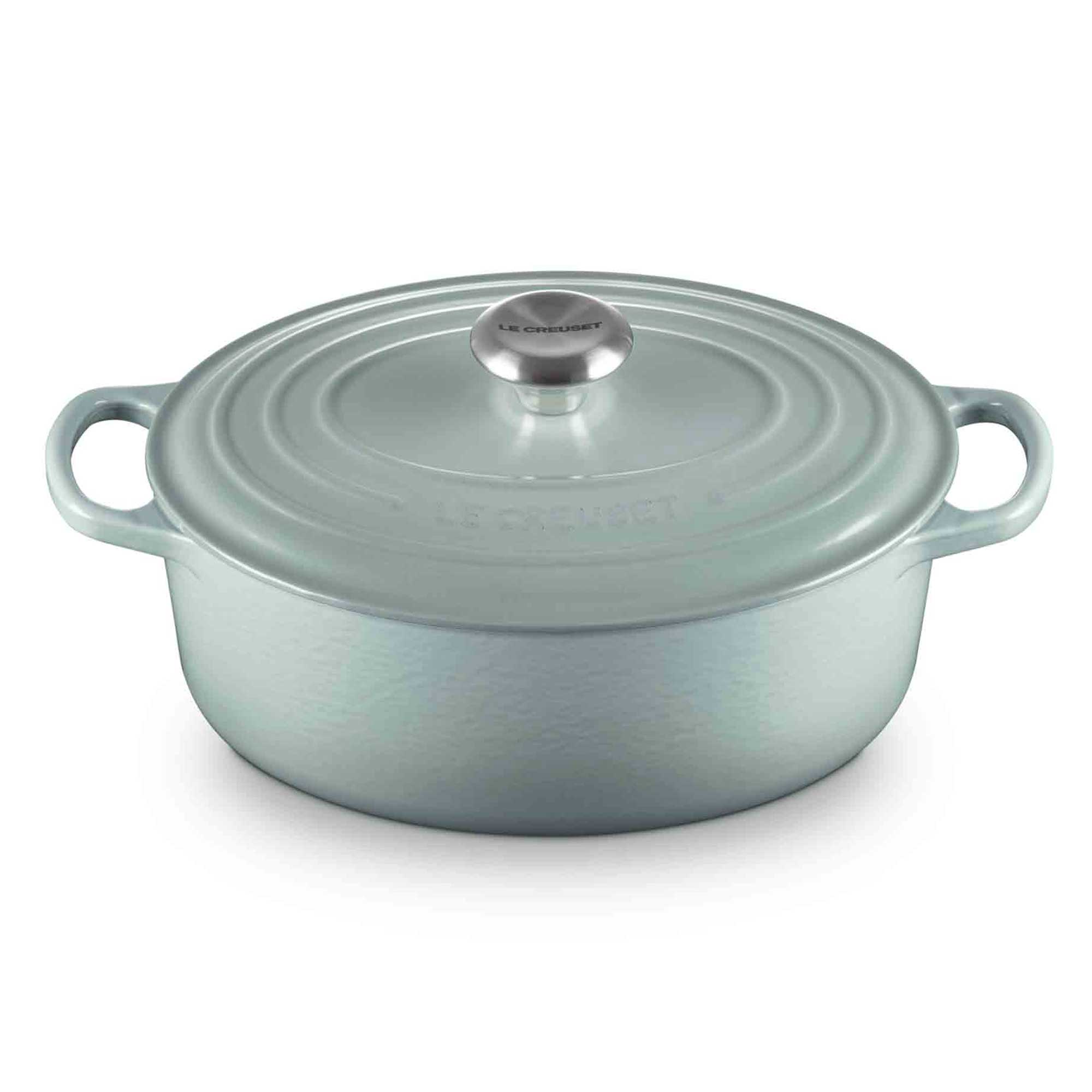 Light blue casserole with a lid on a white background