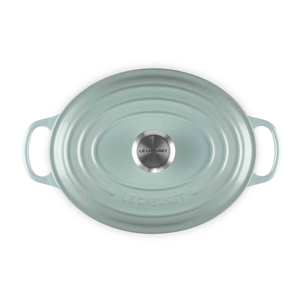 Le Creuset Sea Salt Oval Casserole with lid and handles on white background