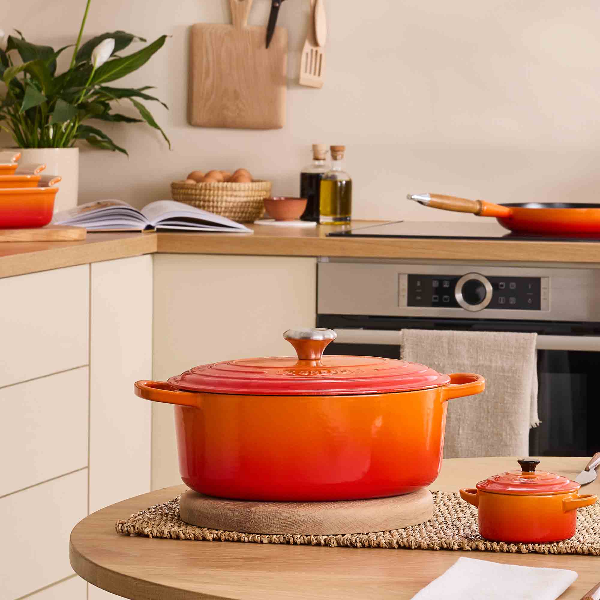 Le Creuset volcanic oval cast iron casserole with lid in kitchen on a table