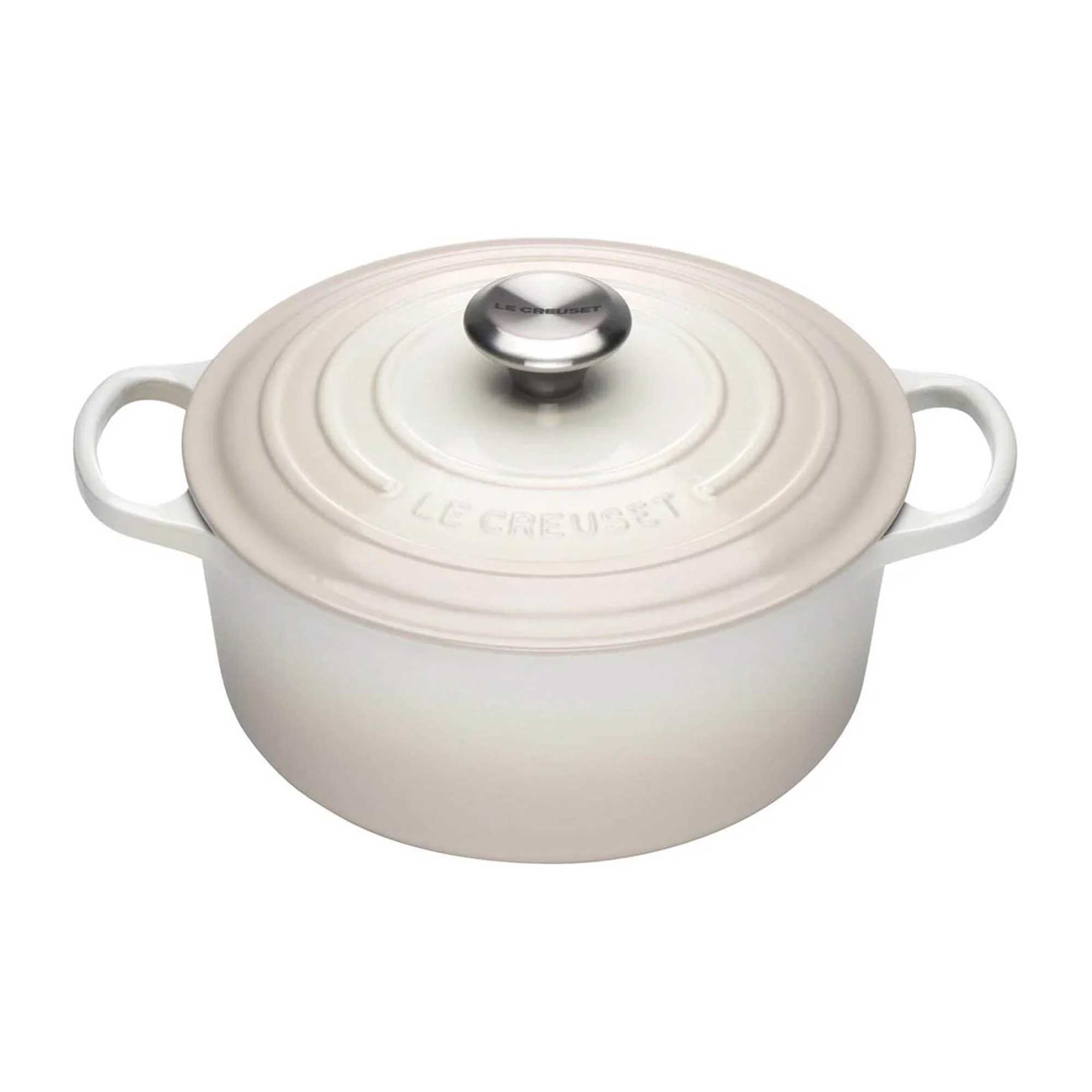 Meringue enameled cast iron cookware pot with lid on a white background