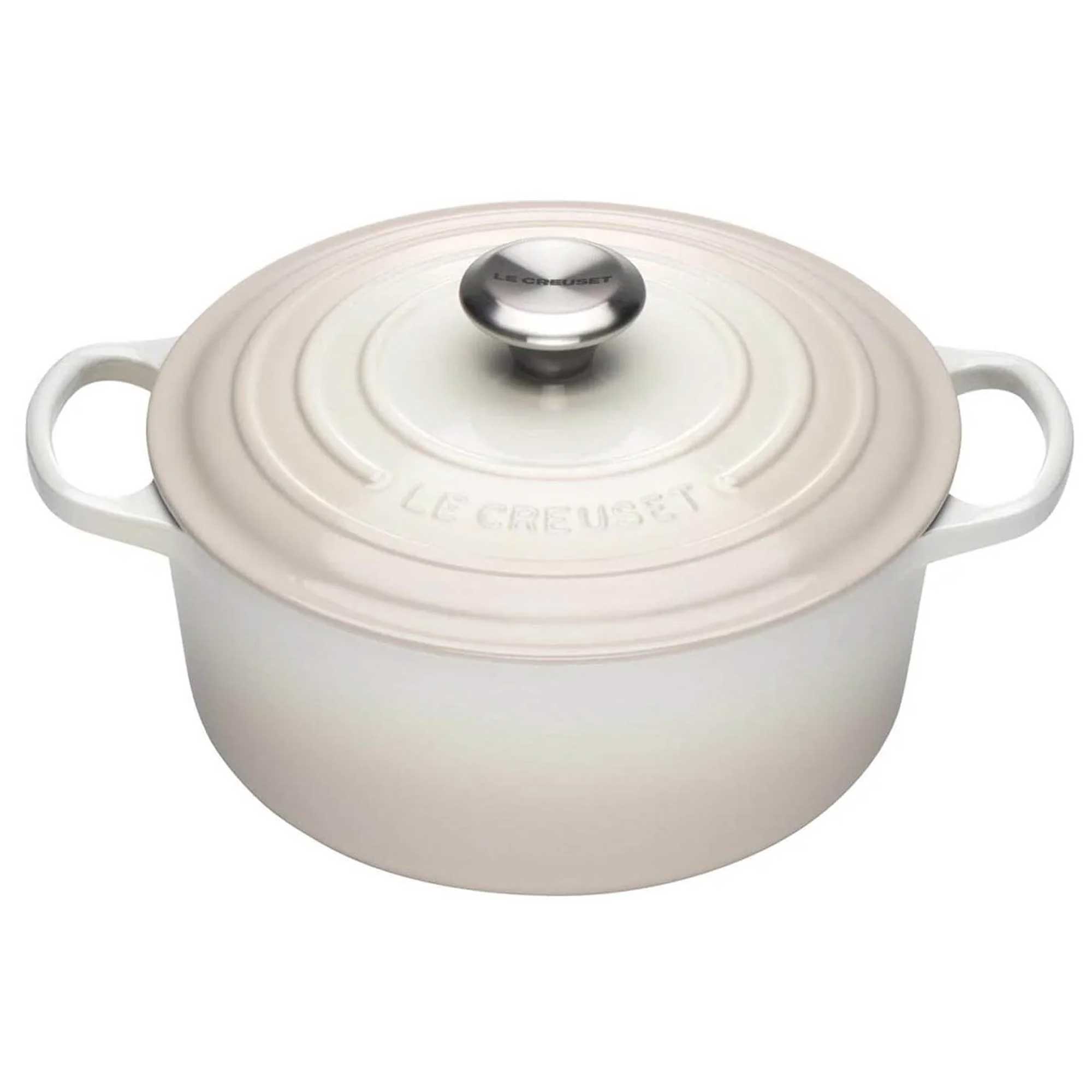 Meringue enameled cast iron Dutch oven with a lid on a white background