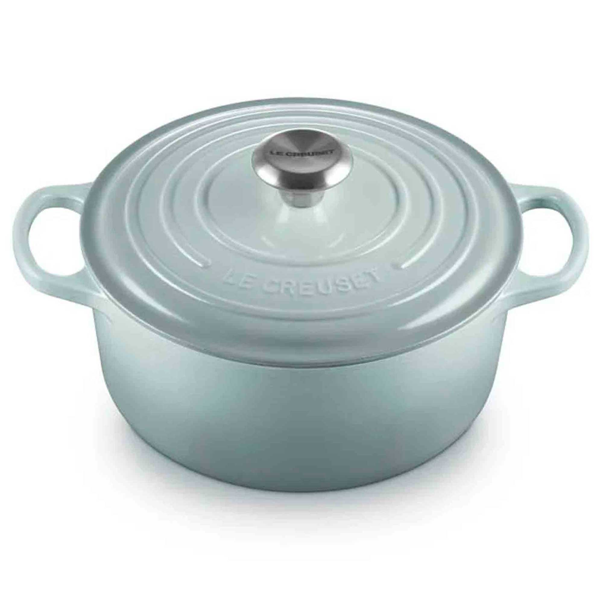 Sea salt enameled cast iron casserole with lid on a white background
