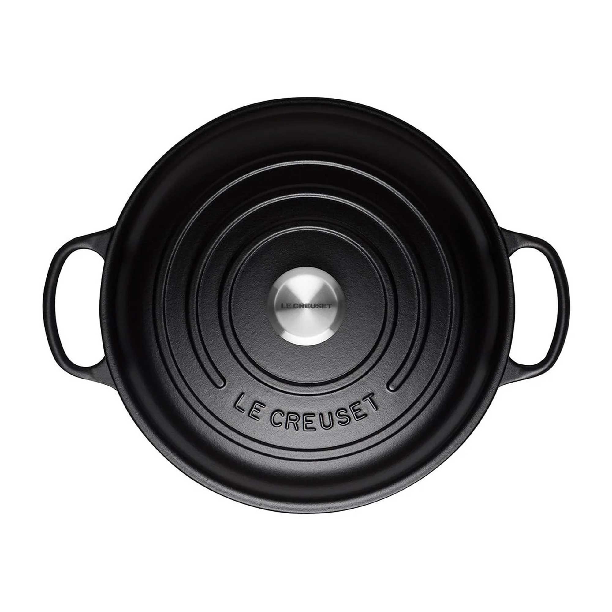 Black Le Creuset pot on a white background